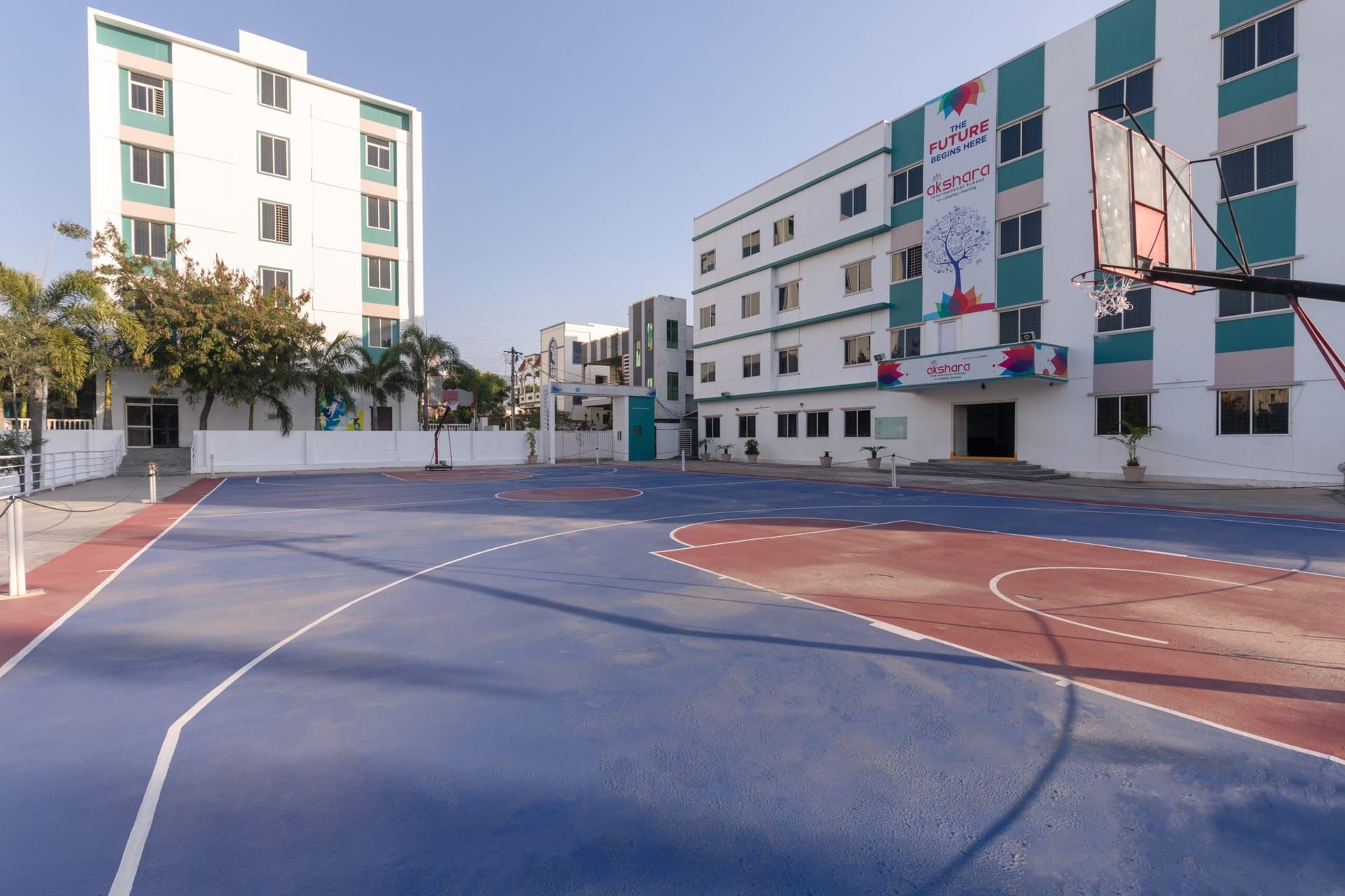 Outdoor basketball court on an Akshara campus