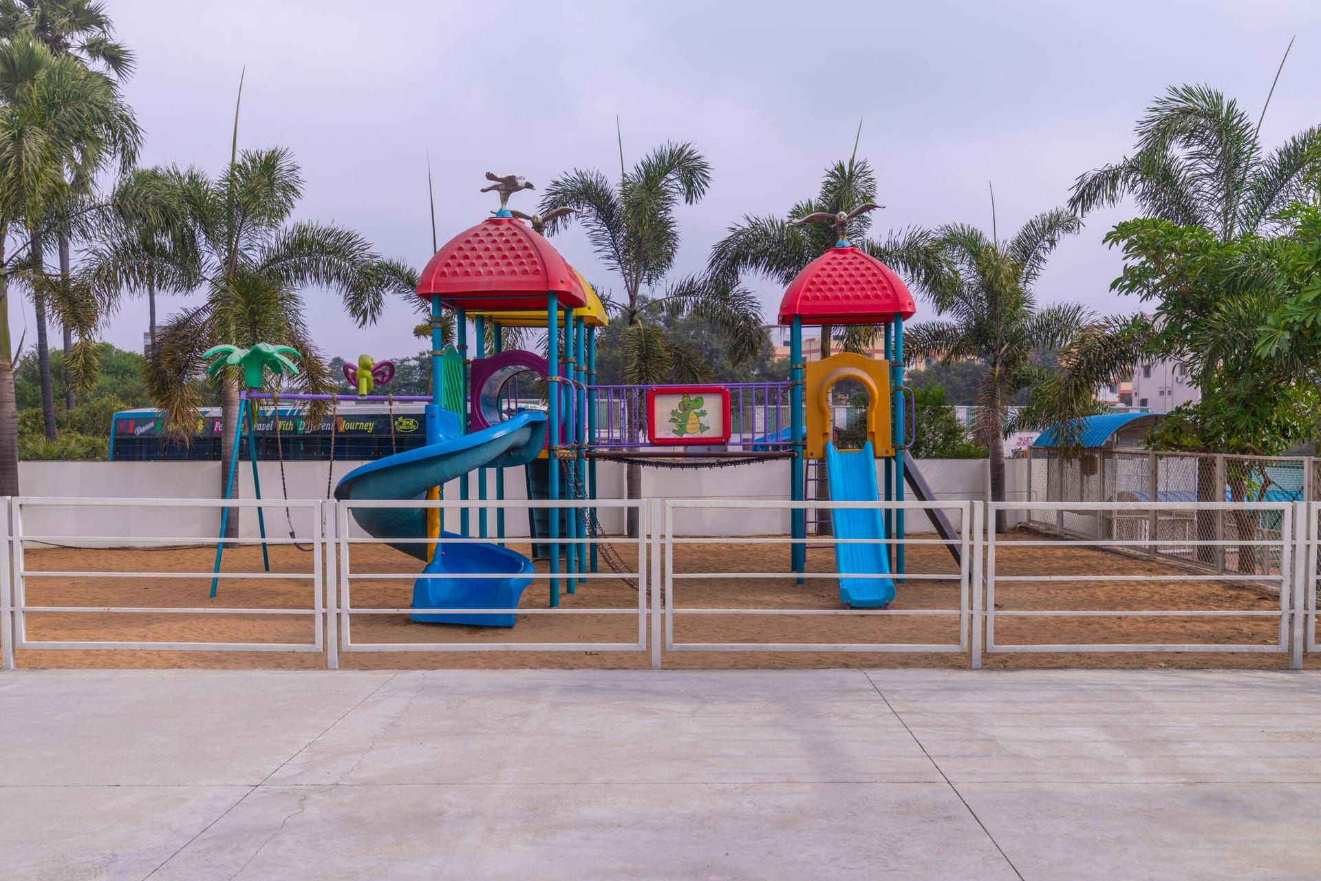 Pre-primary outdoor play area with slides and play houses