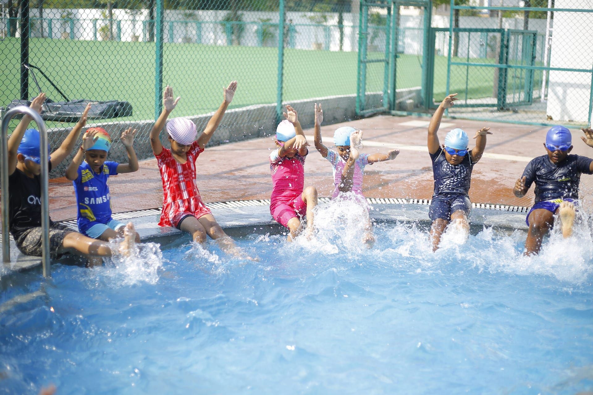 Young children playing in the pre-primary splash pool